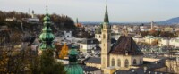 A Picturesque View Of Salzburg, Showcasing The City'S Historic Architecture And Skyline.